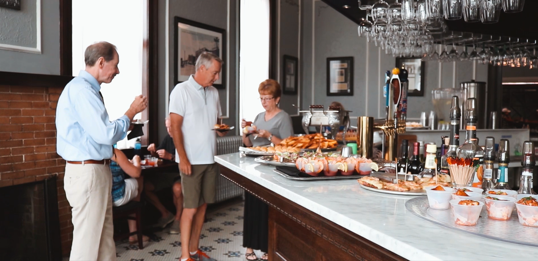 Catering options displayed on bar at The Continental Hotel restaurant Lucile's
