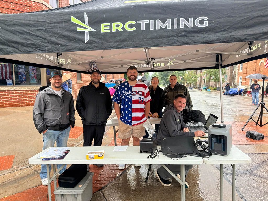 Fun run volunteers in rain at 2026 Pancake Day