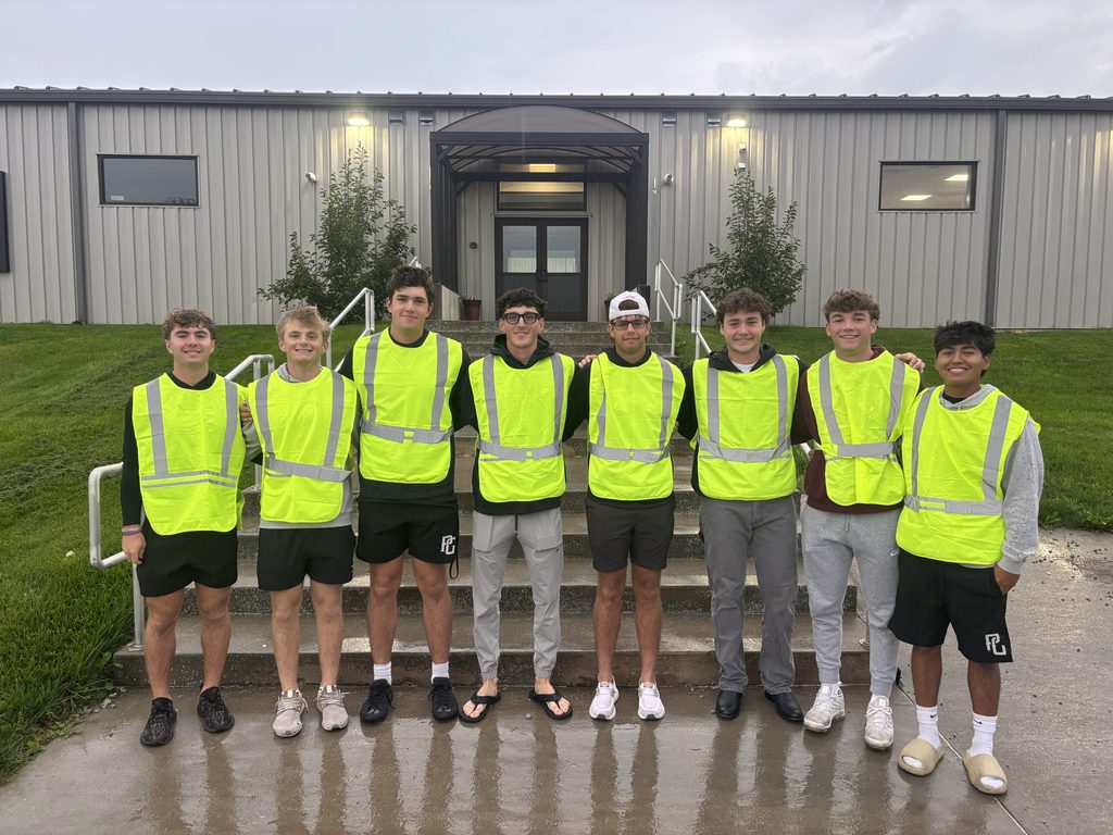 Volunteers from Indian Hills Community College in high visibility vests for 2026 Pancake Day